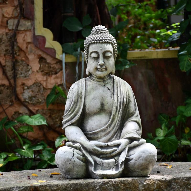 Statue Bouddha jardin assis