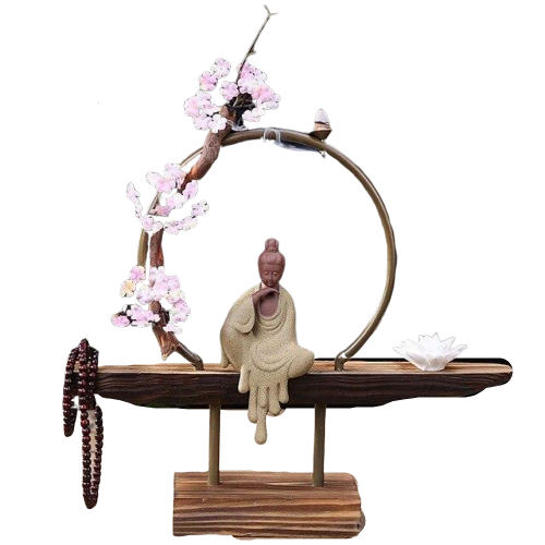 Porte Encens Bouddha Assis Avec Une Fleur De Lotus